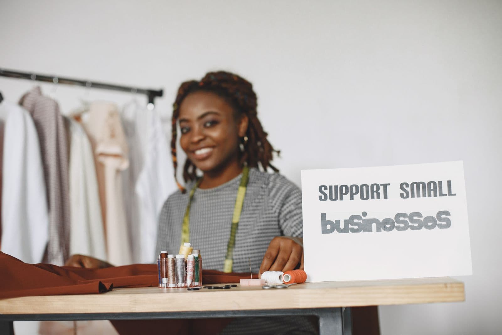 Entrepreneur at her desk supporting small businesses